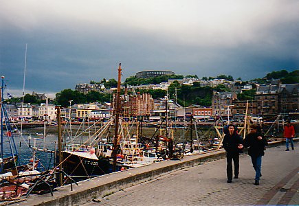 Picture of a view over the harbour of Oban, the folly in the background