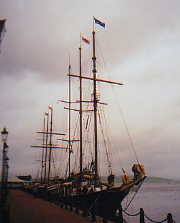 Picture of two tall ships at the pier, the Sir Winston Churchill and the Malcolm Miller