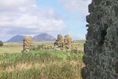 Picture of partly overgrown ruins of very old houses