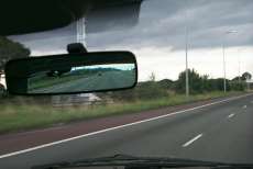 Picture of a view into a back mirror