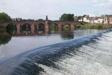 Picture of a river and an old bridge