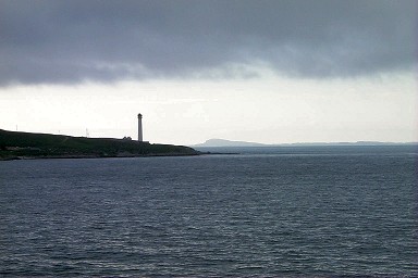 Picture of a lighthouse with another island in the background