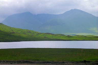 Picture of a view over a loch (lake), mountains in the background