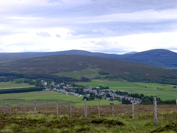 Picture of a village stretching along a road