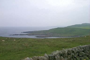 Picture of a view over a coastline with a bay