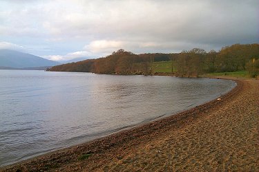 Picture of a beach at Loch Lomond in the winter evening sun
