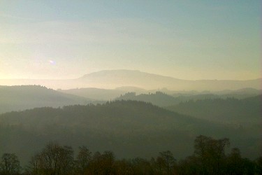 Picture of a view from the visitor centre near Aberfoyle over hills in the haze