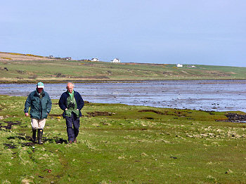 Picture of two walkers near Loch Gruinart