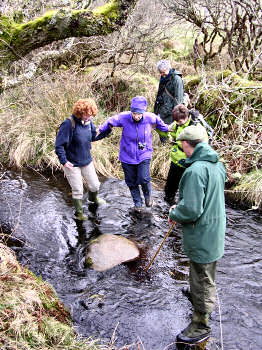 Picture of people crossing Ardbeg Burn