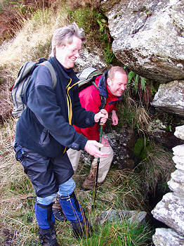 Picture of my mother throwing a penny into the wishing well