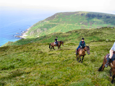 Picture of riders arriving on the top of the hills