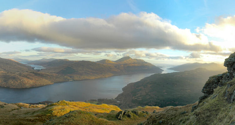 Picture of a panoramic view over a loch surrounded by hills