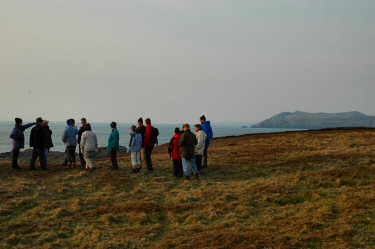 Picture of walkers in the evening sun