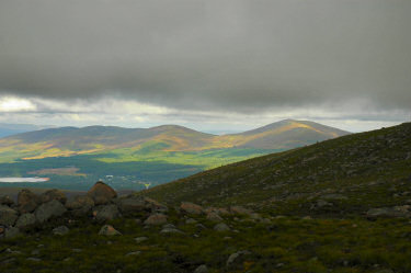 Picture of clouds lifting over lower hills