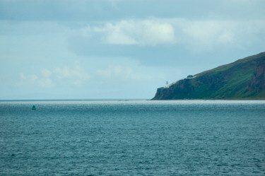 Picture of a lighthouse and a buoy