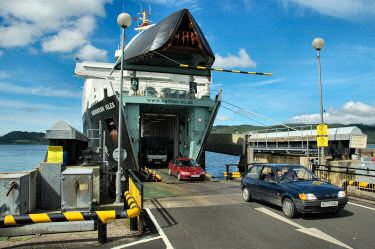 Picture of cars driving off a ferry