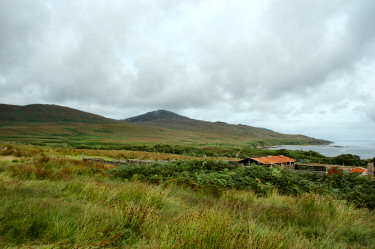 Picture of an empty landscape with clouds above it