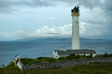 Picture of a lighthouse with another island in the background