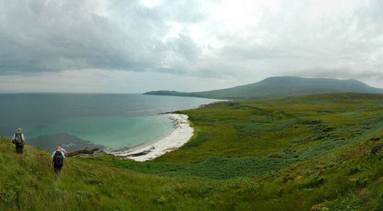 Picture of a panoramic view over a bay with a large hill in the background
