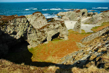 Picture of a rugged coastline with arches and caves