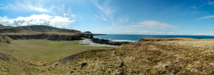 Picture of a panoramic view over raised beaches and the sea