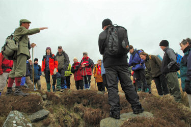 Picture of walkers looking at an old lime kiln