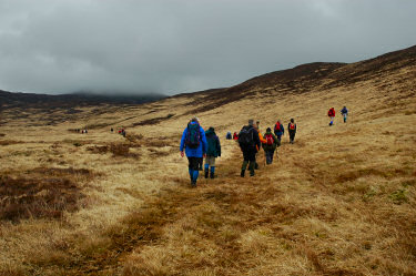 Picture of walkers on rough ground