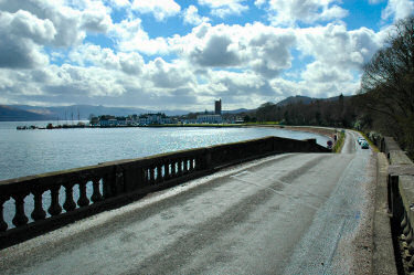 Picture of a view to a village from a bridge