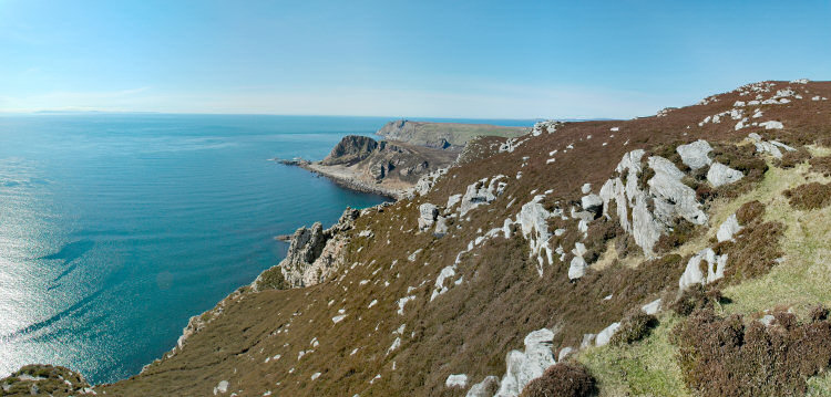 Panoramic picture of a view over the sea and sea cliffs