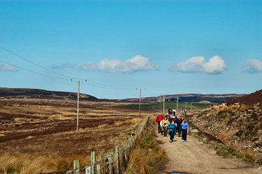Picture of a group of walkers on a track