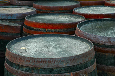 Picture of a close up view of whisky casks