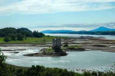 Picture of a castle on a small island in a sea loch