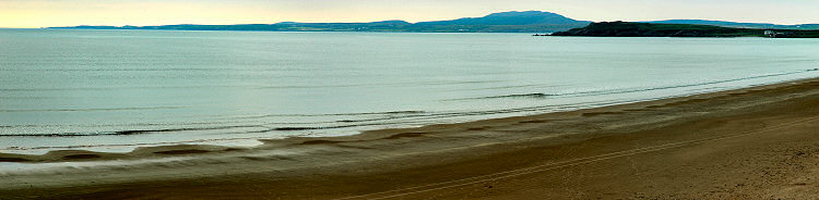 Picture of a panoramic view over a beach in the late afternoon light