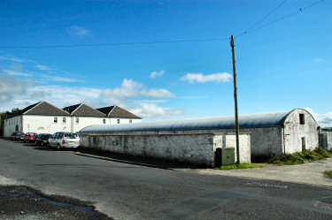 Picture of whitewashed buildings, former warehouses of a distillery