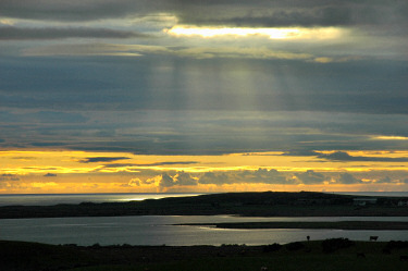 Picture of a beautiful sunset with a gap opening up in the clouds