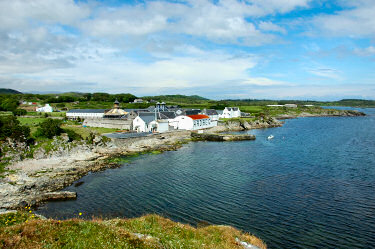 Picture of a view over Ardbeg Distillery from a small hill