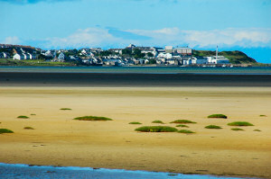 Picture of a coastal village seen across a bay