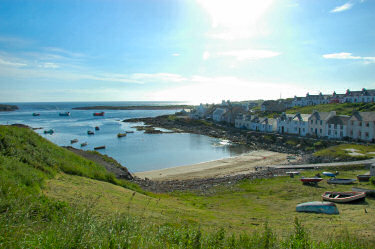 Picture of a view over a coastal village around a small bay/harbour