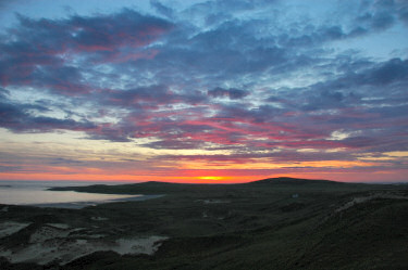 Picture of a sunset over a bay