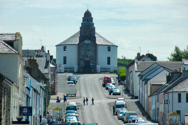 Picture of a view up a street with a round church at the top