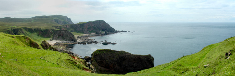 Picture of a panoramic view over wide bay below some cliffs