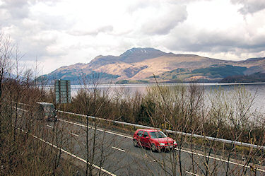 Picture of a mountain behind a freshwater loch, Ben Lomond at Loch Lomond