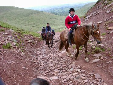 Picture of riders riding up a hill