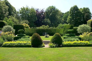 In the garden with the sundial in the centre