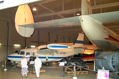 At the entrance to the hangar with the planes