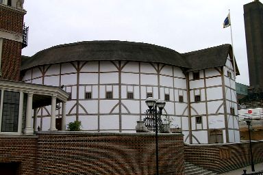 Picture of a white round building, a traditional theatre of Shakespearean times