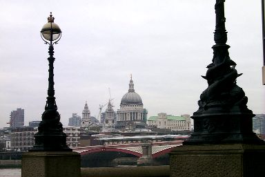 Picture of cathedral seen behind a bridge