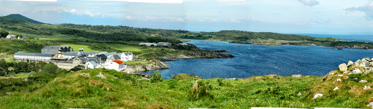 Picture of a panoramic view over a coast with a distillery (Ardbeg)