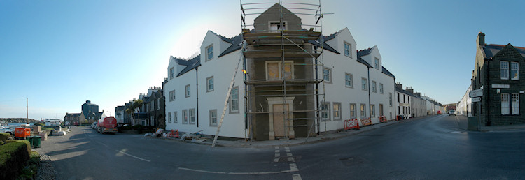 Panorama picture of a building site for a hotel, the walls have now been painted