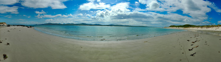 Picture of a panoramic view over a sea loch with surrounding beaches and dunes